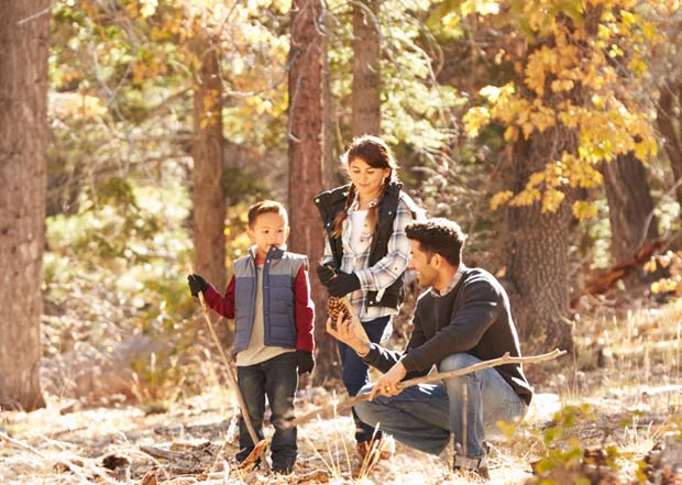 family in fall forest